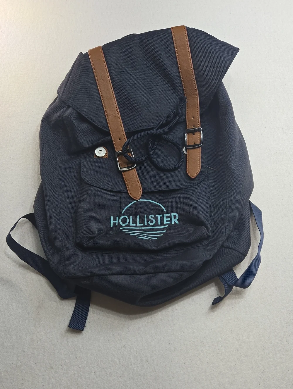 Hollister Navy Backpack with Brown Straps and Light Blue Logo